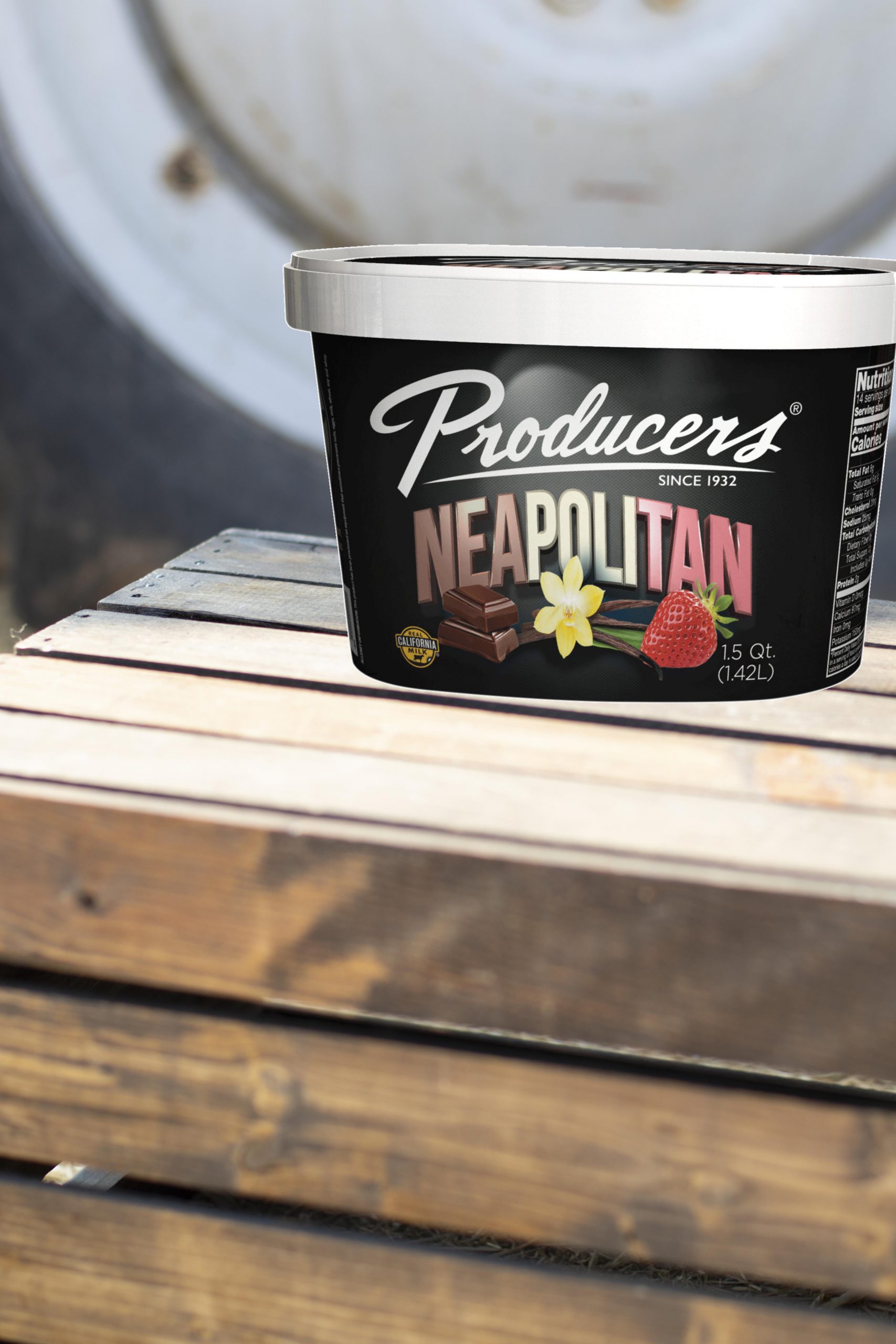 Neapolitan_Farm Neapolitan Producers Ice Cream sitting on wood in front of a tractor.