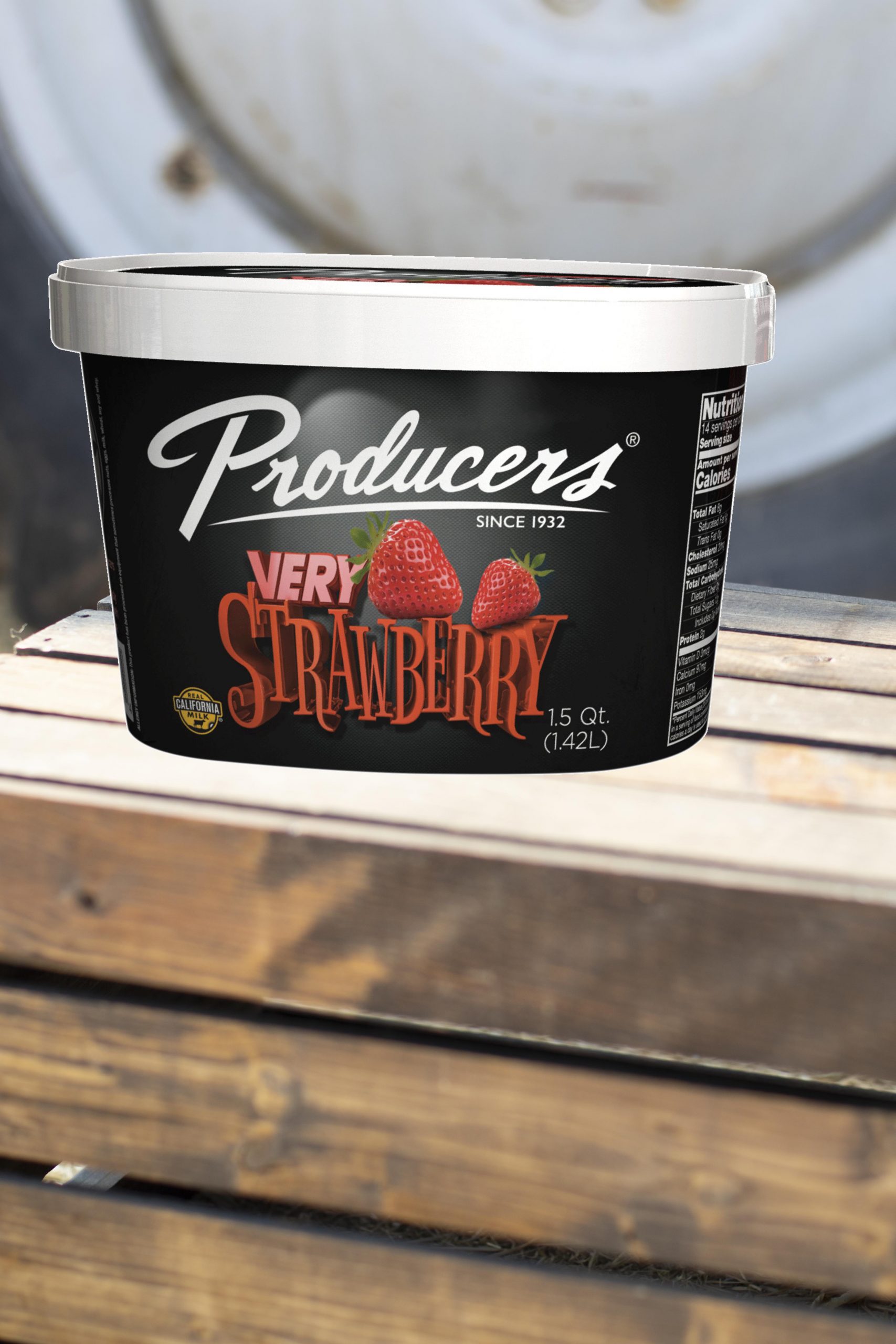 VeryStrawberry_Farm Very Strawberry Producers Ice Cream sitting on wood in front of a tractor.